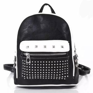 Black & white vegan leather backpack